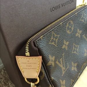 Louis Vuitton Brown wristlet pouchette
